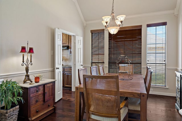 dining room with a chandelier, crown molding, dark hardwood / wood-style floors, and lofted ceiling