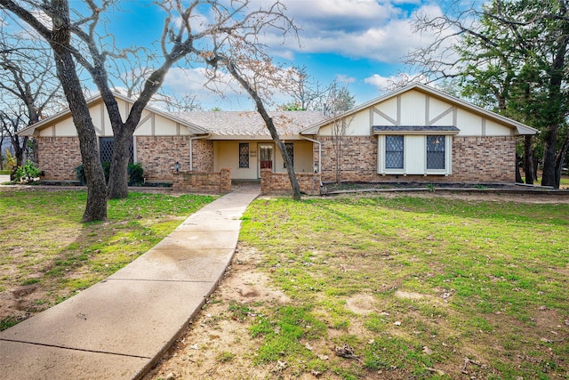 view of front of home with a front lawn