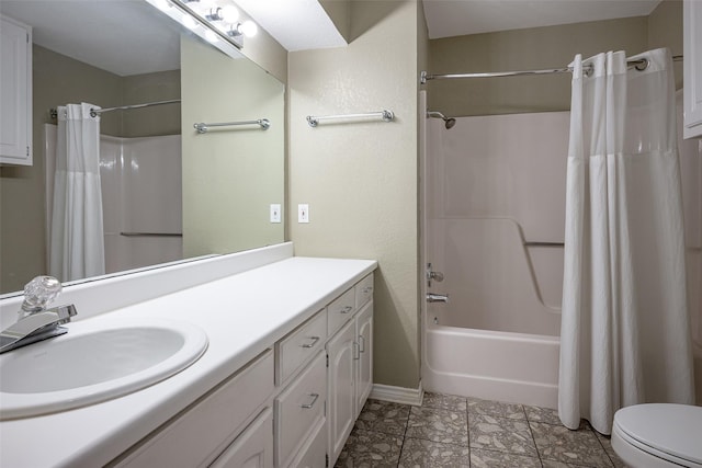 full bathroom with vanity, toilet, and shower / tub combo with curtain