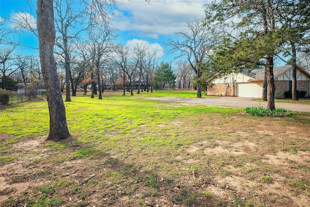 view of yard featuring a garage