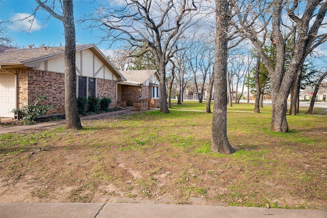 view of yard with a garage