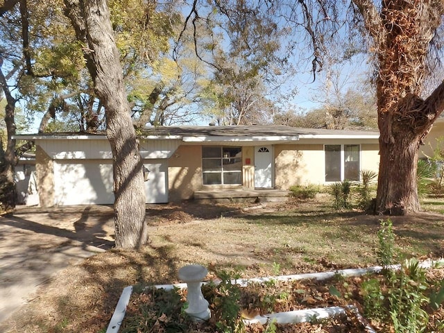 ranch-style house with a garage