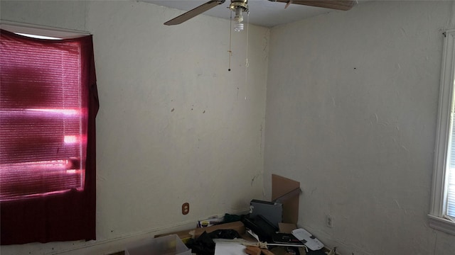 unfurnished room featuring ceiling fan