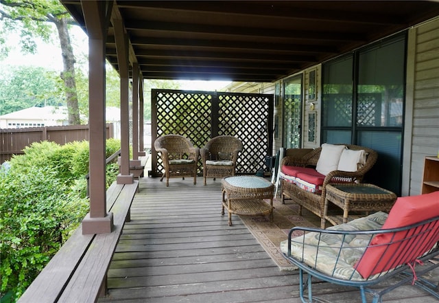 1030 Laurel Ln, Paris, TX 75460 - deck with an outdoor hangout area and fence