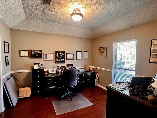 1030 Laurel Ln, Paris, TX 75460 - office space with lofted ceiling, visible vents, a textured ceiling, and wood finished floors