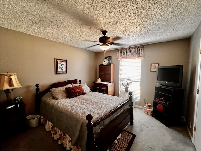 1030 Laurel Ln, Paris, TX 75460 - carpeted bedroom with a textured ceiling and a ceiling fan