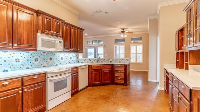 kitchen with decorative backsplash, white appliances, ceiling fan, crown molding, and sink