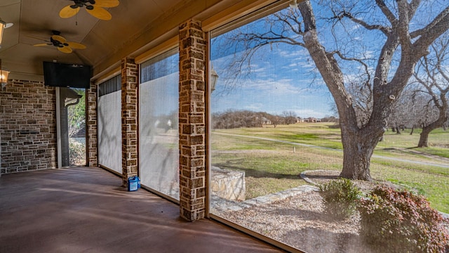 view of patio featuring ceiling fan