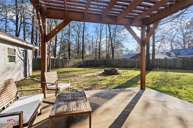 view of patio / terrace with a pergola and an outdoor fire pit