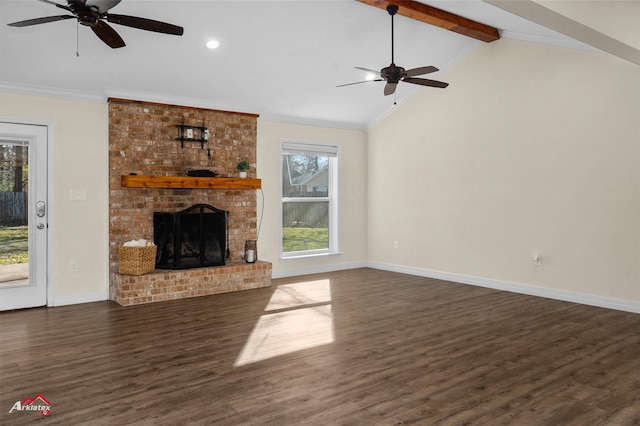 unfurnished living room featuring lofted ceiling with beams, ceiling fan, dark hardwood / wood-style flooring, and a brick fireplace