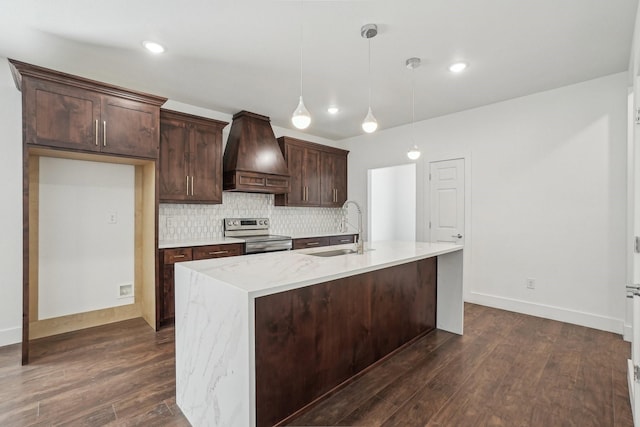 kitchen featuring sink, stainless steel range with electric stovetop, hanging light fixtures, dark brown cabinetry, and custom exhaust hood