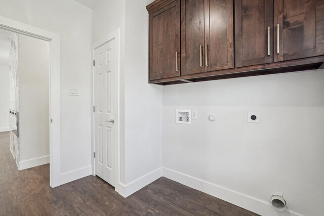 laundry area featuring dark wood-type flooring, cabinets, washer hookup, hookup for an electric dryer, and hookup for a gas dryer