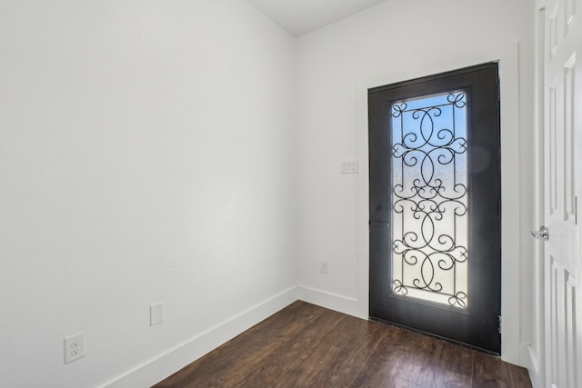 foyer featuring dark hardwood / wood-style floors