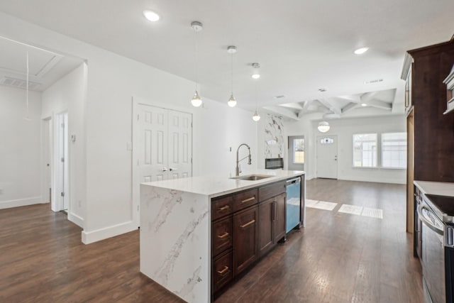 kitchen with sink, decorative light fixtures, stainless steel dishwasher, a kitchen island with sink, and stove