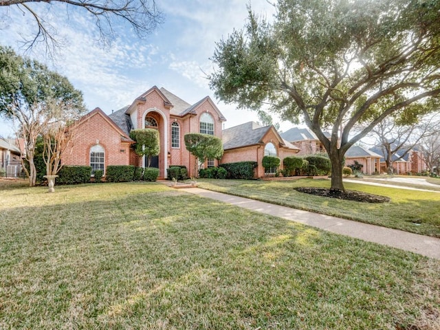 view of property with a front lawn