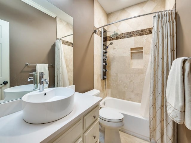 full bathroom featuring shower / tub combo with curtain, vanity, toilet, and tile patterned flooring