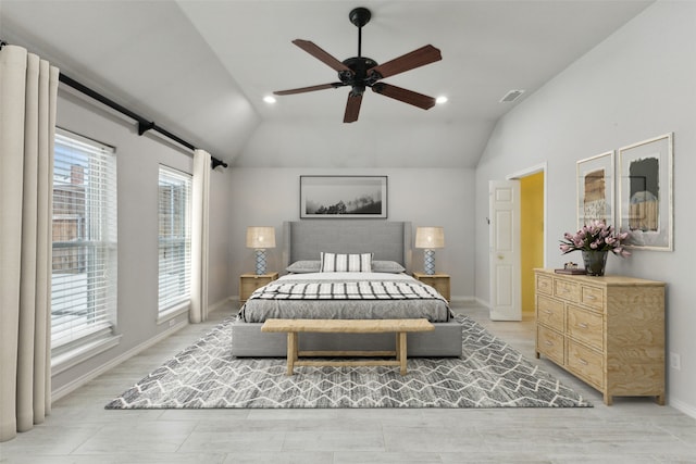 bedroom with lofted ceiling and ceiling fan