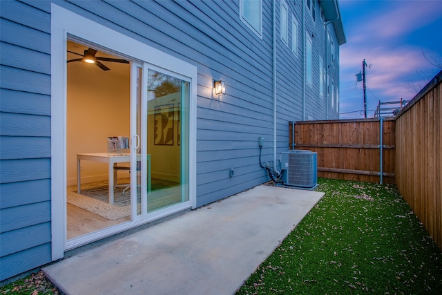 patio terrace at dusk with central AC unit