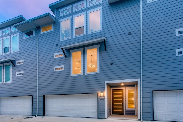 exterior space with a garage