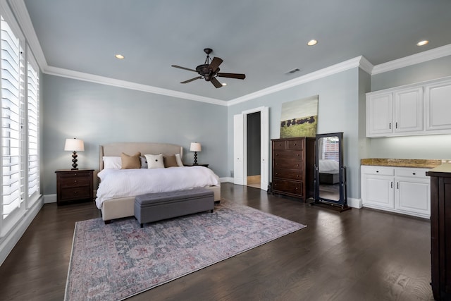 bedroom featuring multiple windows, dark hardwood / wood-style floors, and ceiling fan