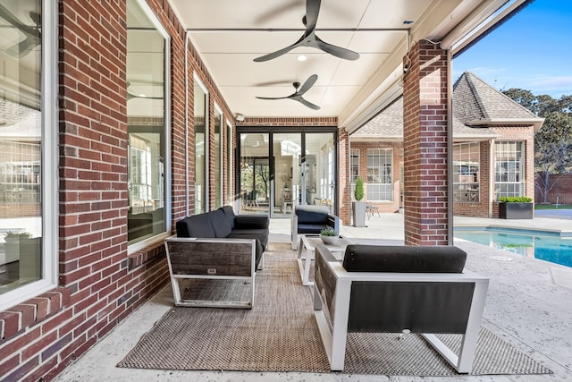 view of patio featuring an outdoor living space and ceiling fan