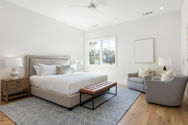 bedroom featuring ceiling fan and hardwood / wood-style flooring