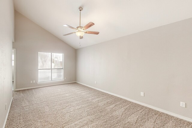 unfurnished room featuring ceiling fan, carpet floors, and high vaulted ceiling