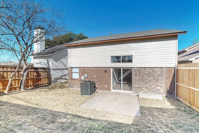 back of house featuring a patio and central AC unit