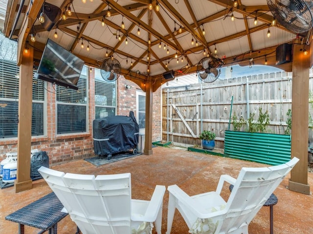 view of patio featuring a gazebo and area for grilling