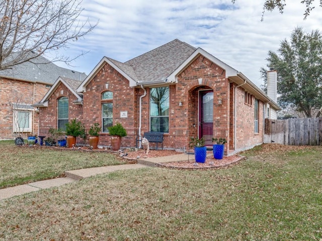 view of front of property with a front lawn