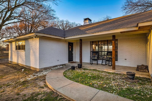 entrance to property with a porch