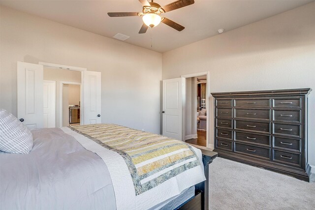 carpeted bedroom with ceiling fan