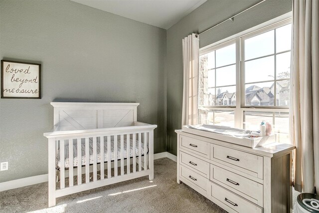 bedroom with light carpet