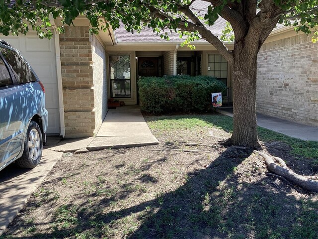 exterior space with a garage