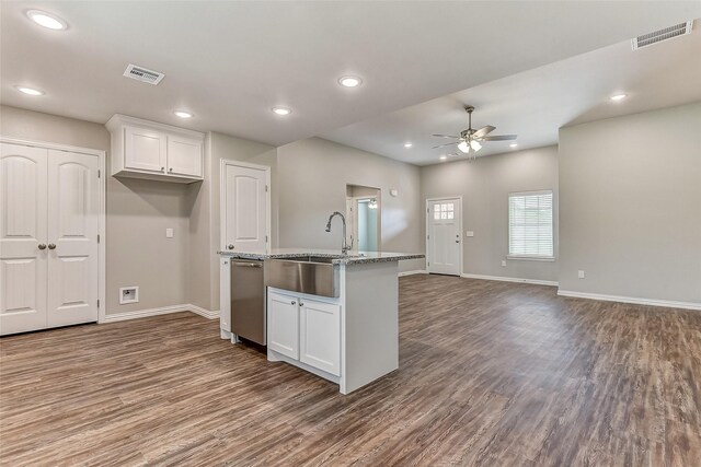 kitchen with dishwasher, hardwood / wood-style flooring, white cabinetry, and ceiling fan