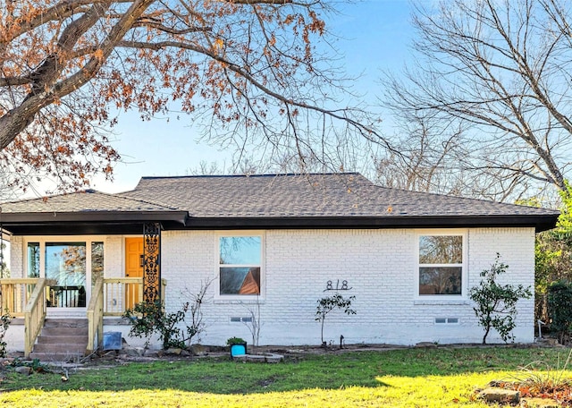 exterior space featuring a lawn