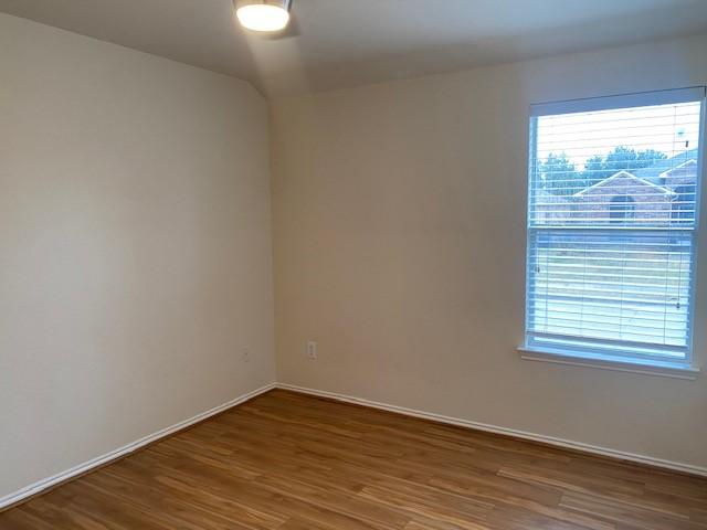 bathroom with a wealth of natural light and independent shower and bath