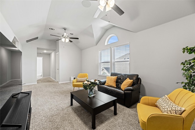 carpeted living room featuring ceiling fan and lofted ceiling