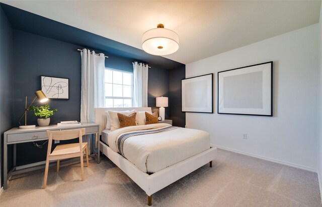 bedroom with light colored carpet