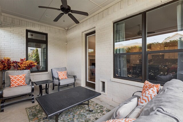 view of patio featuring outdoor lounge area and ceiling fan