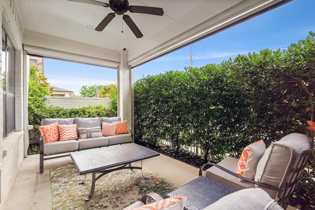 sunroom / solarium with ceiling fan