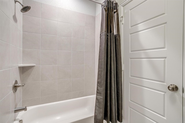 bathroom featuring shower / bathtub combination with curtain