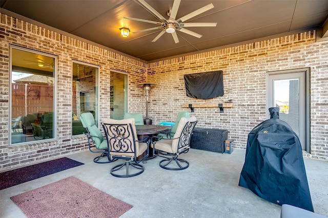 view of patio featuring ceiling fan