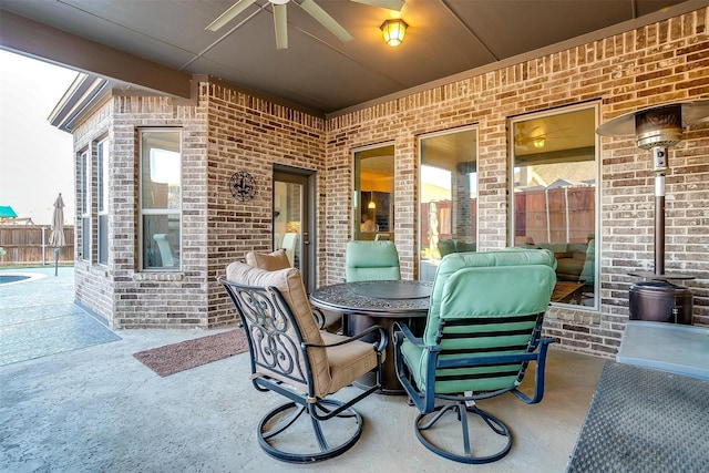 view of patio featuring ceiling fan