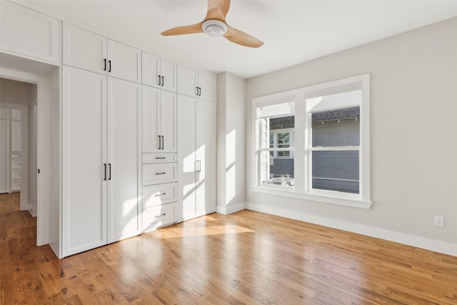 unfurnished bedroom with light wood-type flooring, a closet, and ceiling fan