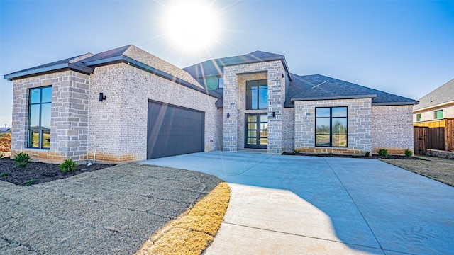 view of front of property featuring a garage