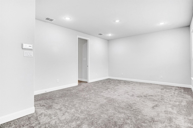 empty room featuring carpet flooring