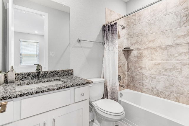 full bathroom featuring vanity, toilet, and shower / tub combo with curtain