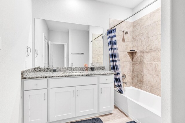 bathroom with vanity and shower / tub combo