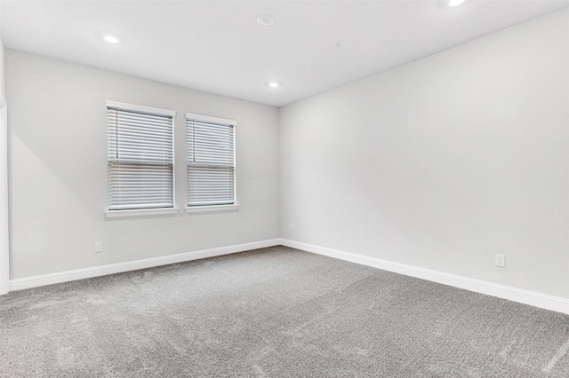 spare room featuring carpet floors